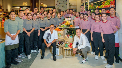 A group shot of founders Donnie and Christopher Tantoco with the staff at Joel’s Place Rockwell.