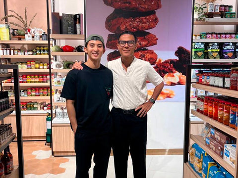 Joel's Place CEO and president Donnie Tantoco with son, Christian Tantoco, between grocery aisles at Joel's Place Proscenium