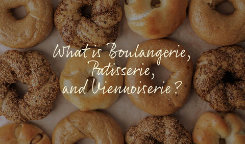 Different kinds of bagels neatly laid out on parchment paper, with a question asking what is boulangerie, patisserie, and viennoiserie?