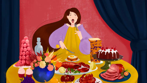 An illustration of a woman wearing a purple top covered with a yellow bib that stretches into a table cover. On top of the table are a variety of abundant illustrated foods, including a cake, a serving of lobster, sliced ham, and a stack of bread. 