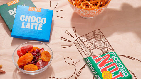 An angled mix of illustrations and a photo of homemade treats for a DIY Halloween candy bark with chocolate and spooky toppings.