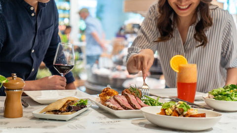 two people enjoying joel's place meals and drinks